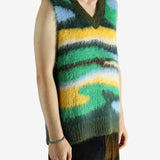 Green vest worn by a person, showing the vest's fit