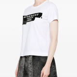 White t-shirt worn by a person, showing the t-shirt's fit