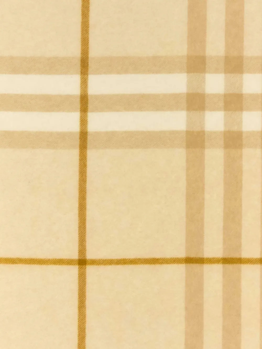 Close up of the tan scarf, showing texture of the cashmere fabric