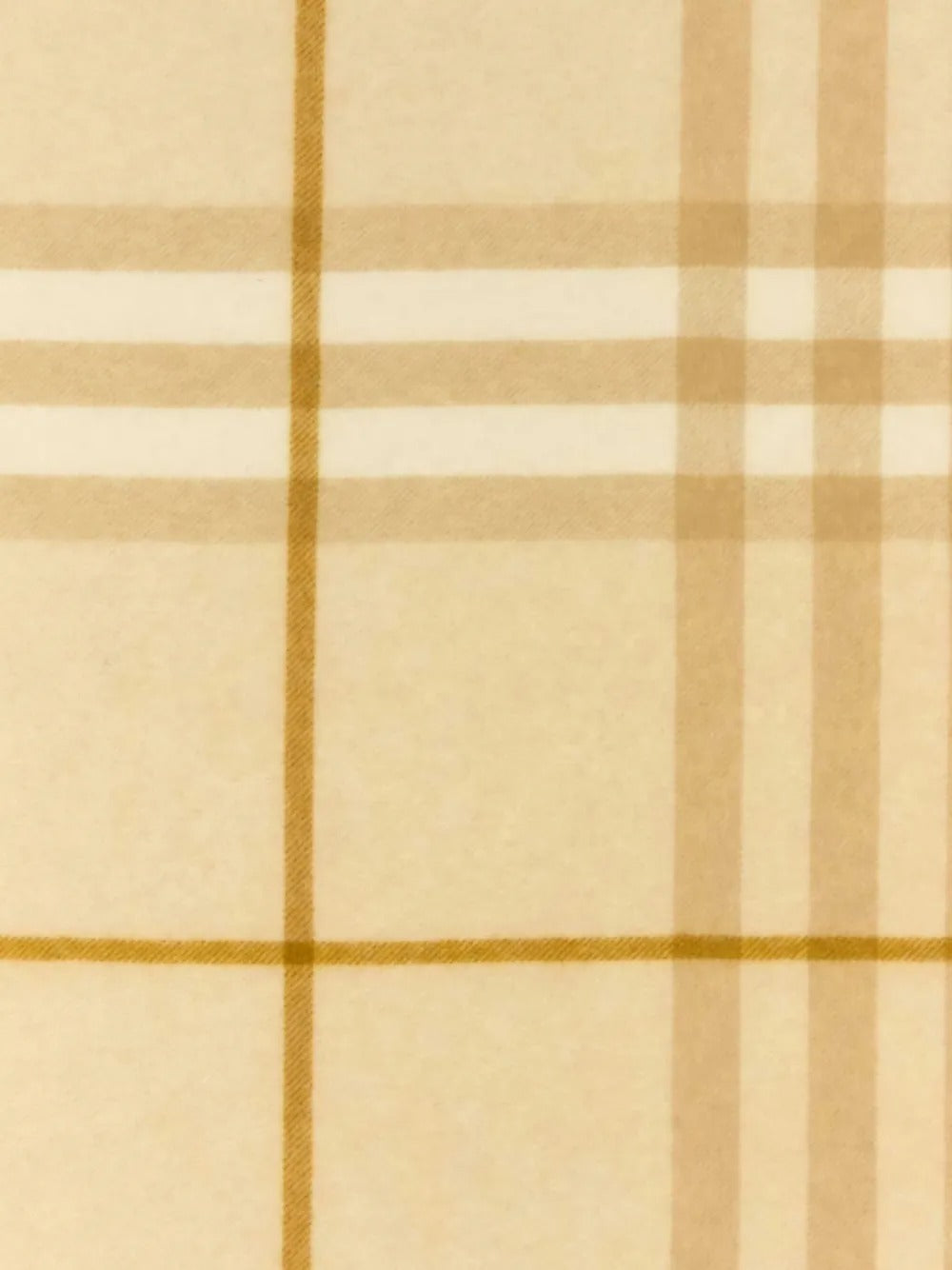 Close up of the tan scarf, showing texture of the cashmere fabric