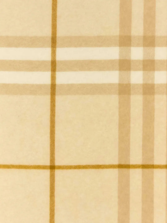 Close up of the tan scarf, showing texture of the cashmere fabric