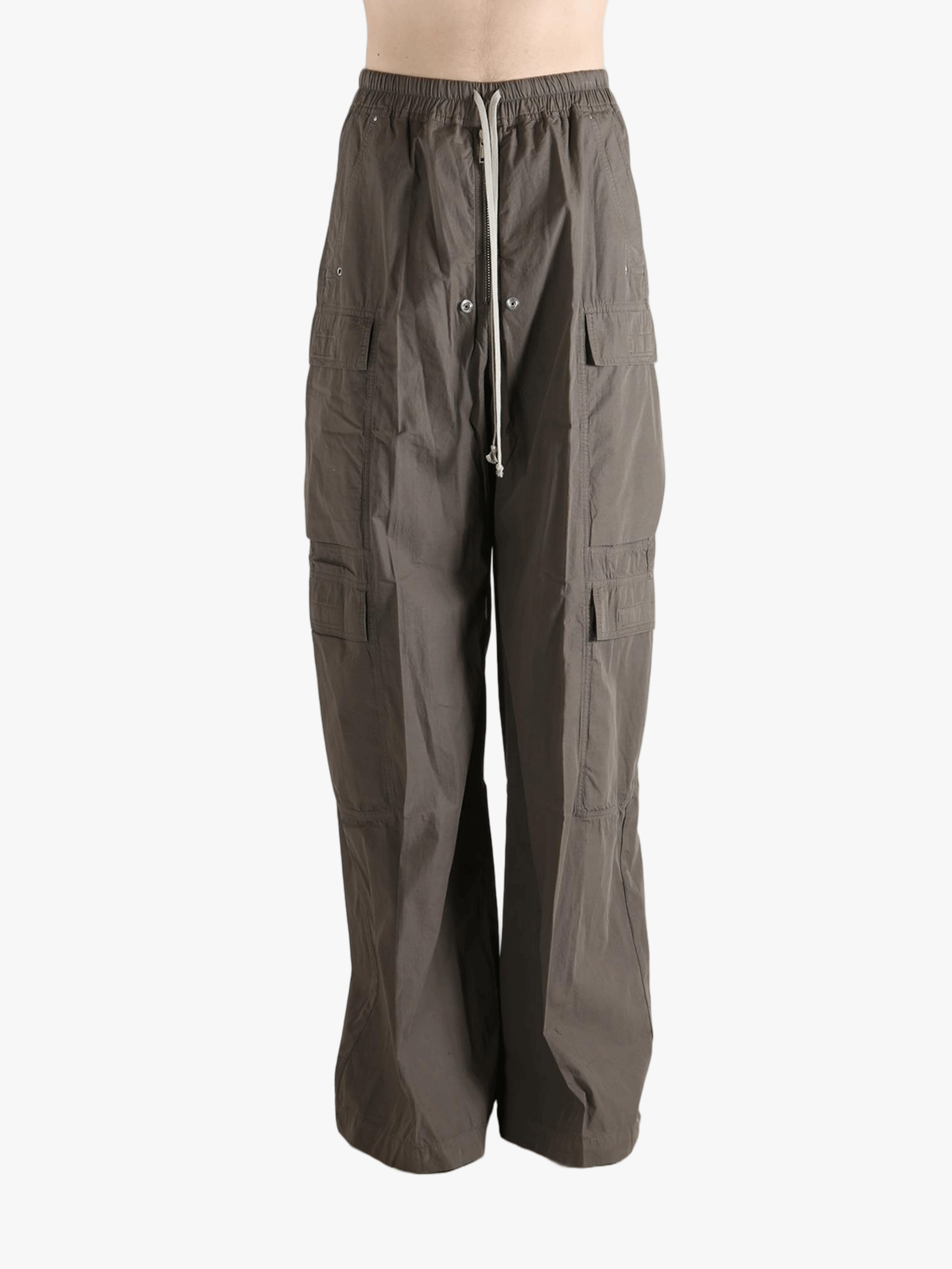 Grey pants worn by a person, showing the pants fit