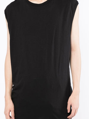 Black top worn by a person, showing the top’s fit