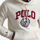 Tan hoodie worn by a person, showing the hoodie fit