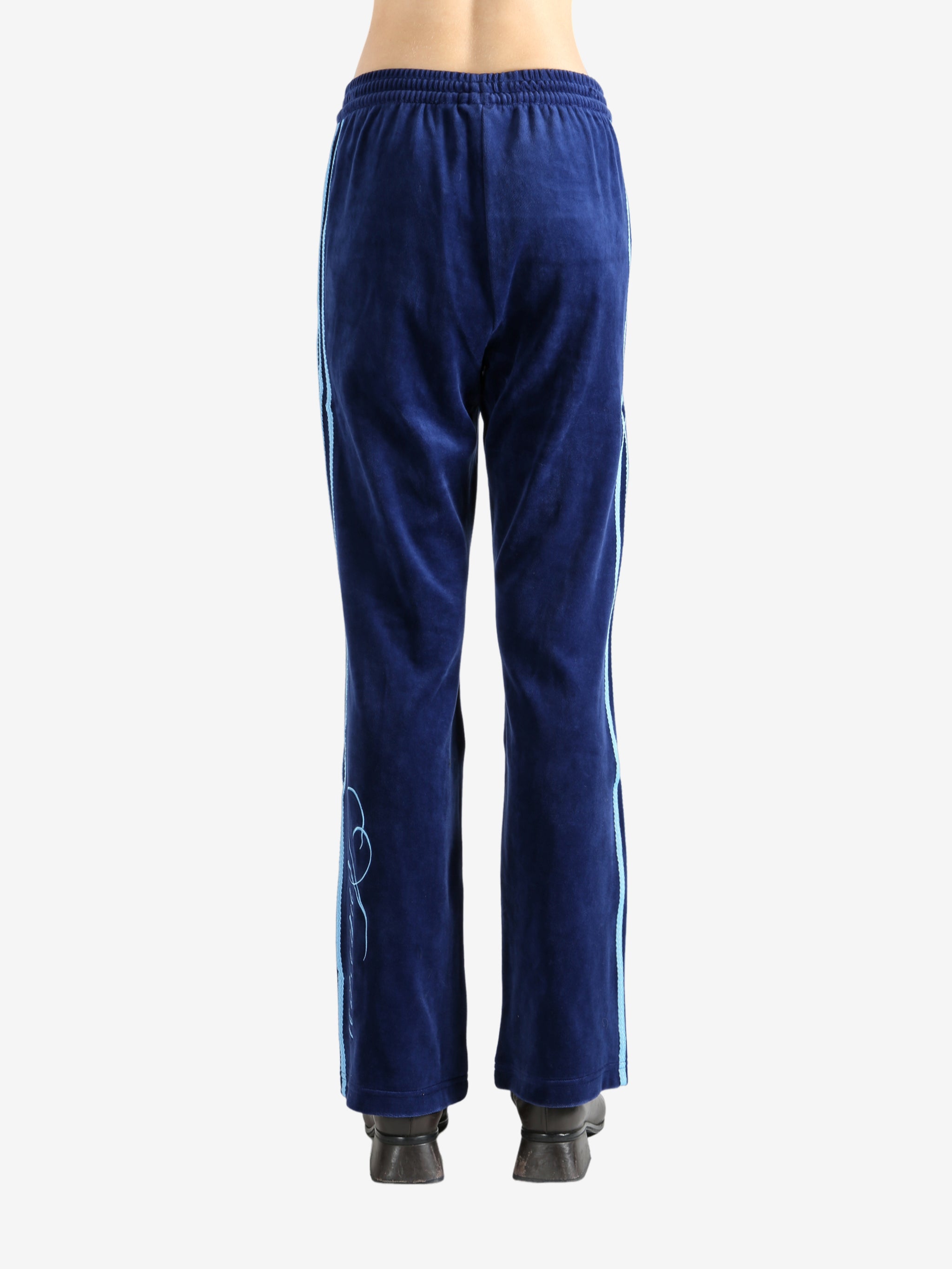 Blue pants worn by a person, showing the pants' fit