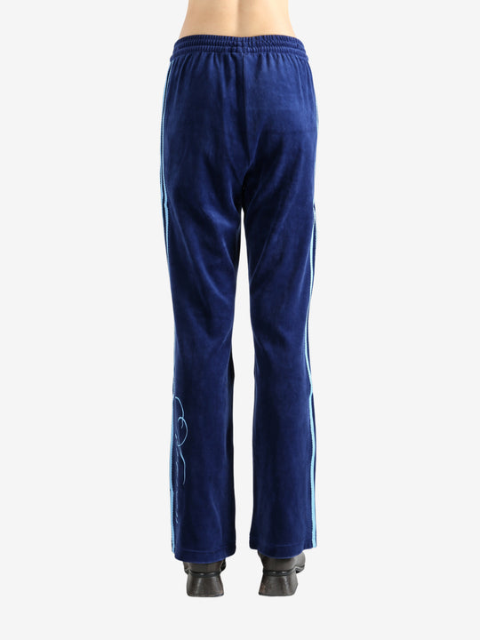 Blue pants worn by a person, showing the pants' fit