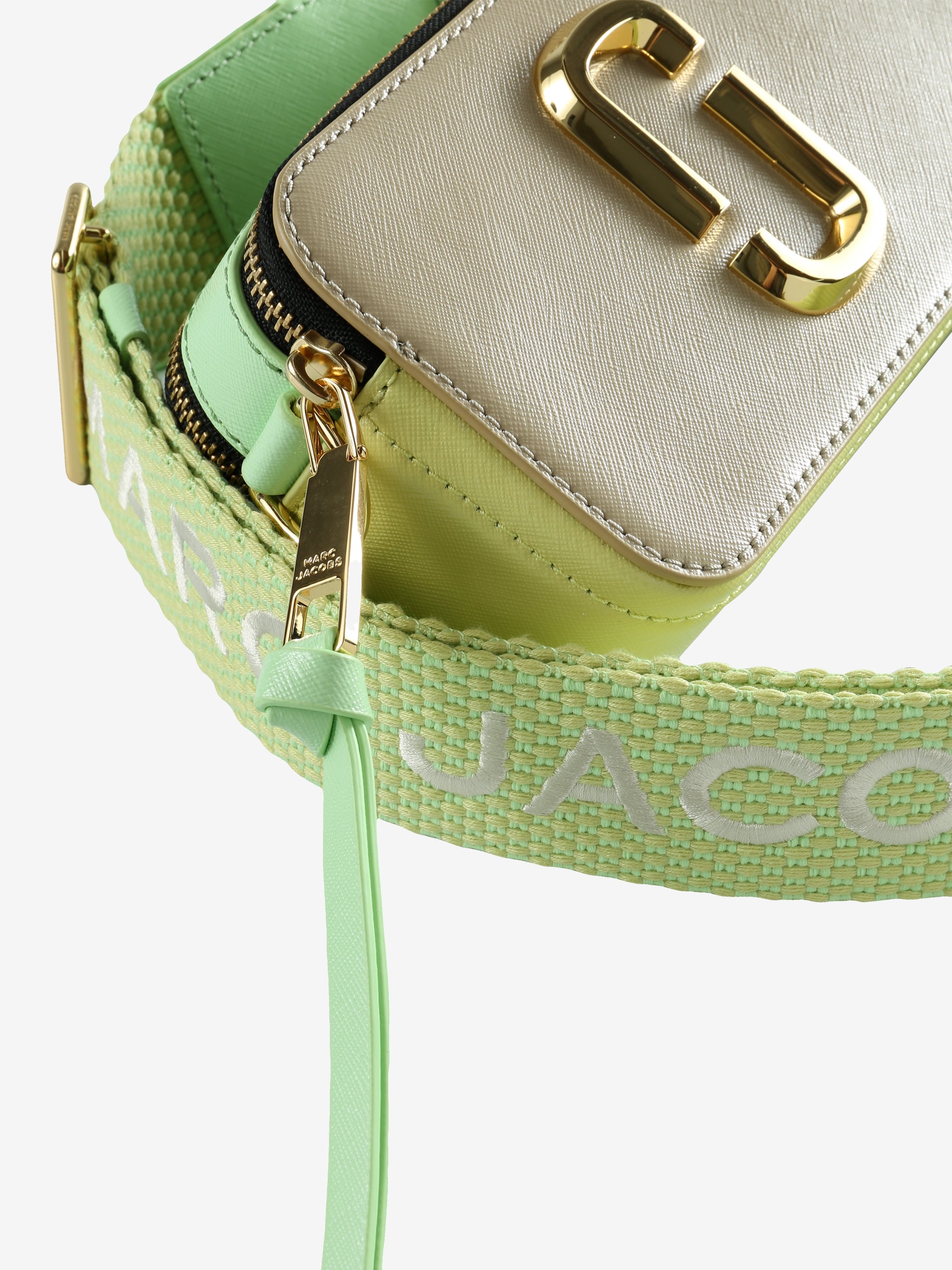 Close up of the green bag, showing texture of the leather fabric