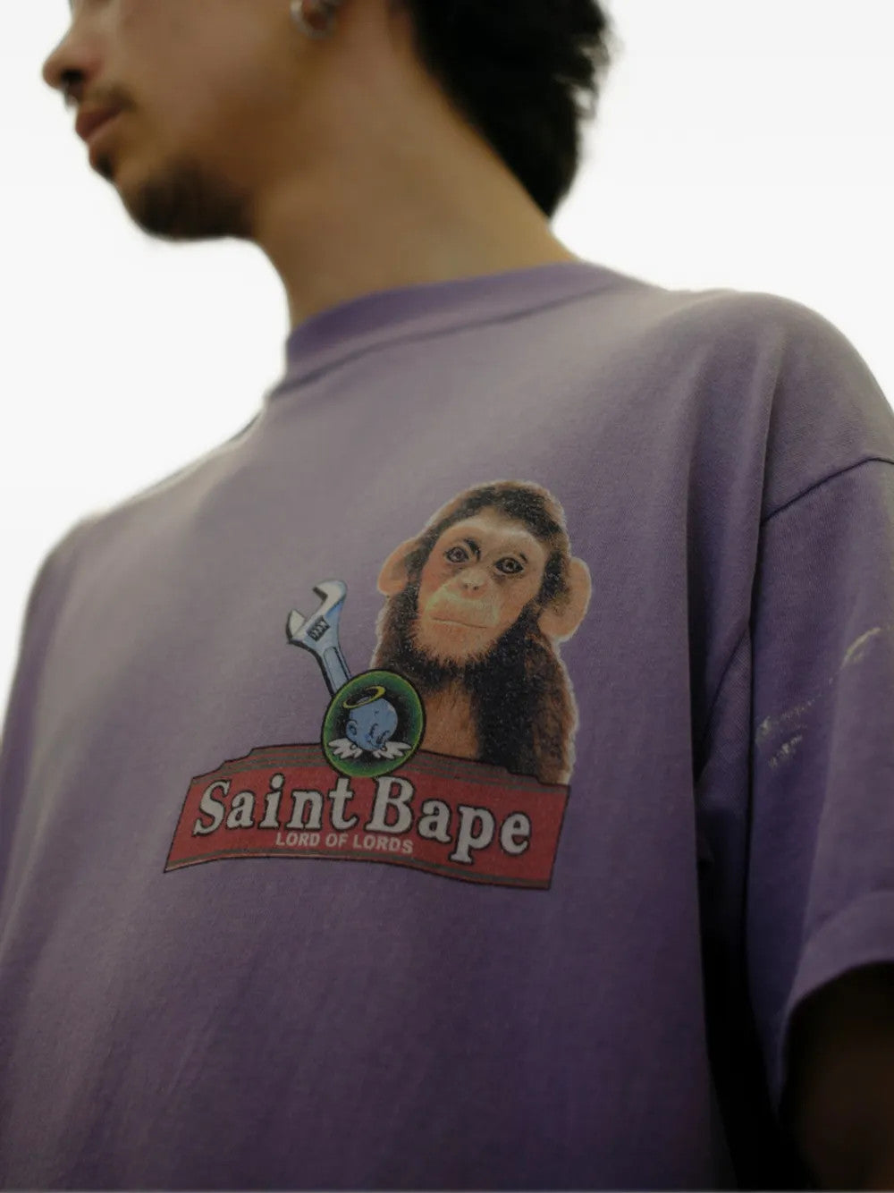 Purple t-shirt worn by a person, showing the t-shirt fit