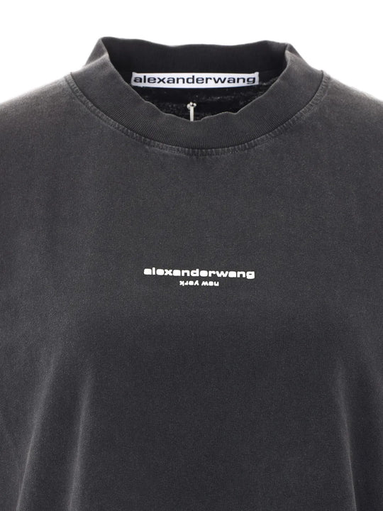 Close up of Black t-shirt, showing texture of the 99% cotton/ 1% elastane fabric