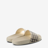 White sandals, back view