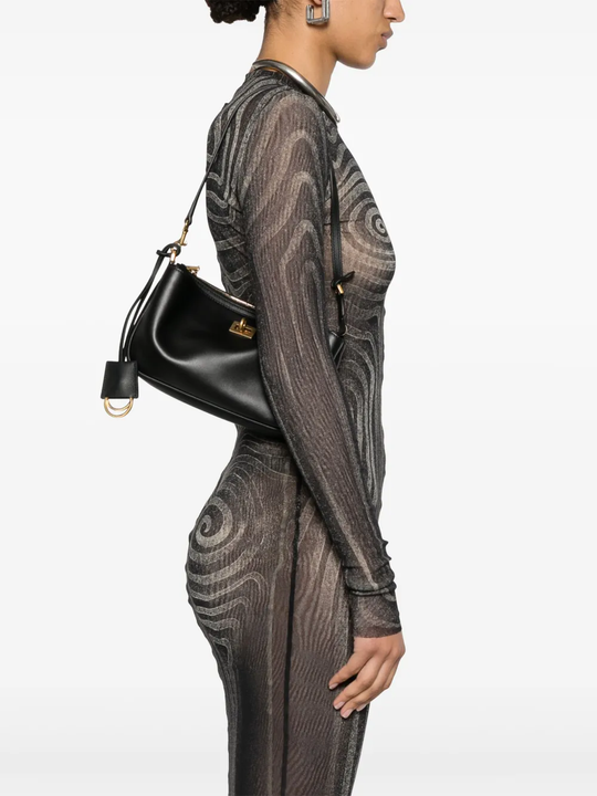 Black bag worn by a person, showing the bag fit