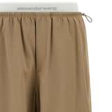 Close up of tan pants, showing texture of the Cotton fabric