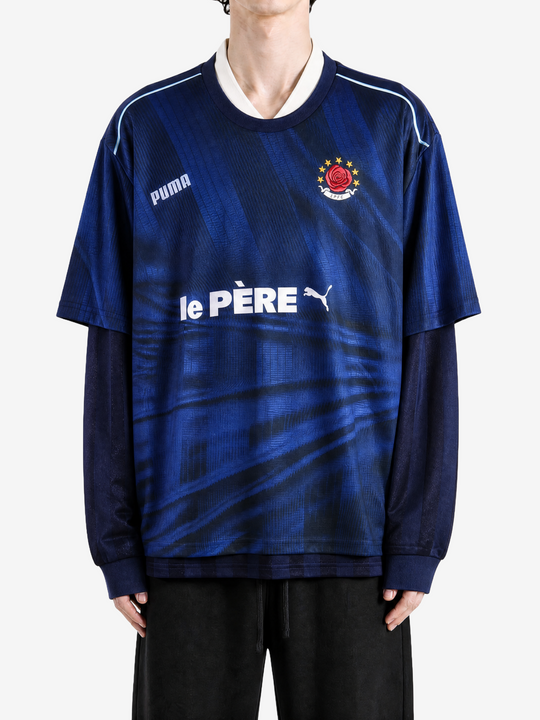 Navy top worn by a person, showing the top fit