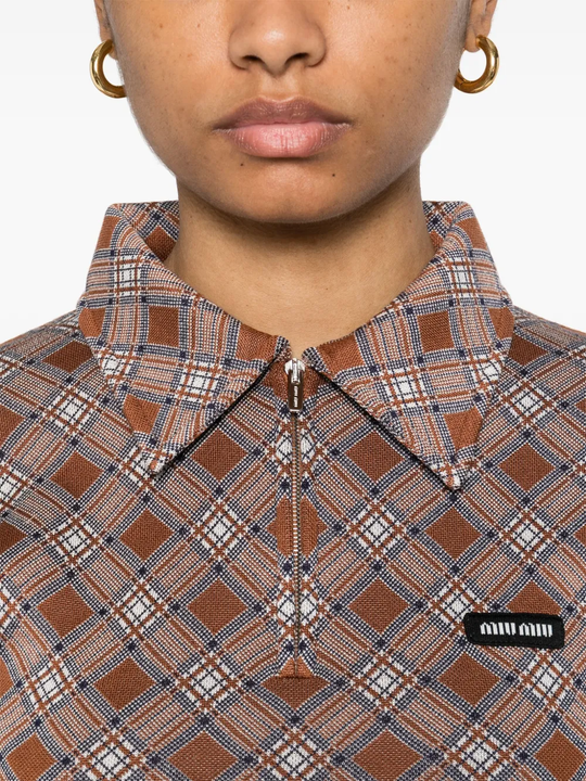 Close up of brown shirt, showing texture of the silk fabric