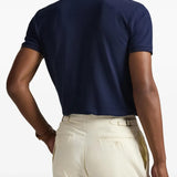 Navy shirt worn by a person, showing the shirt's fit