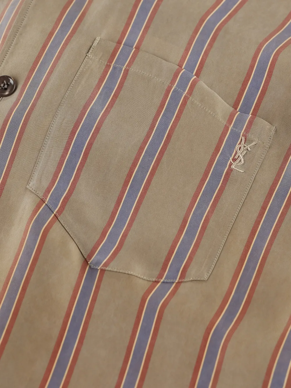 Close up of beige striped shirt,showing texture of the cupro fabric