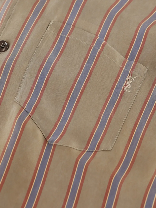 Close up of beige striped shirt,showing texture of the cupro fabric