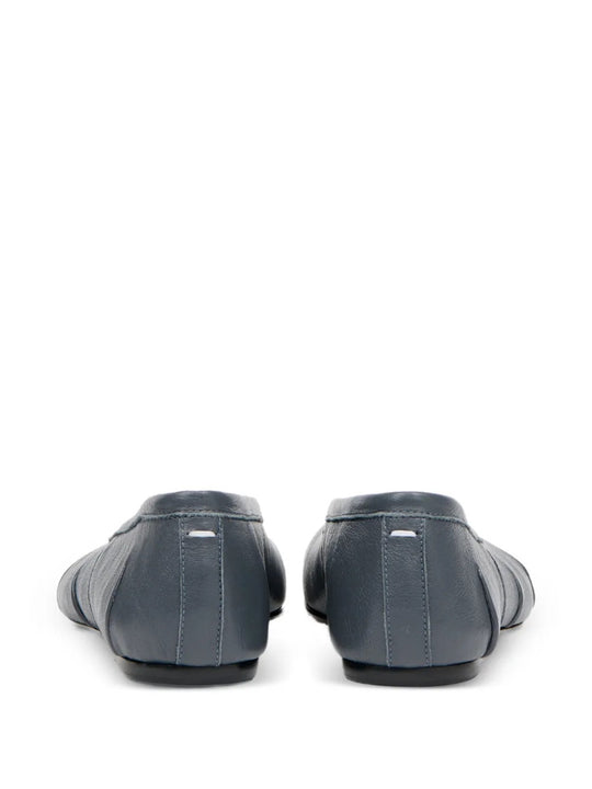 Grey shoes, back view