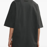 Grey t-shirt worn by a person, showing the shirt's fit