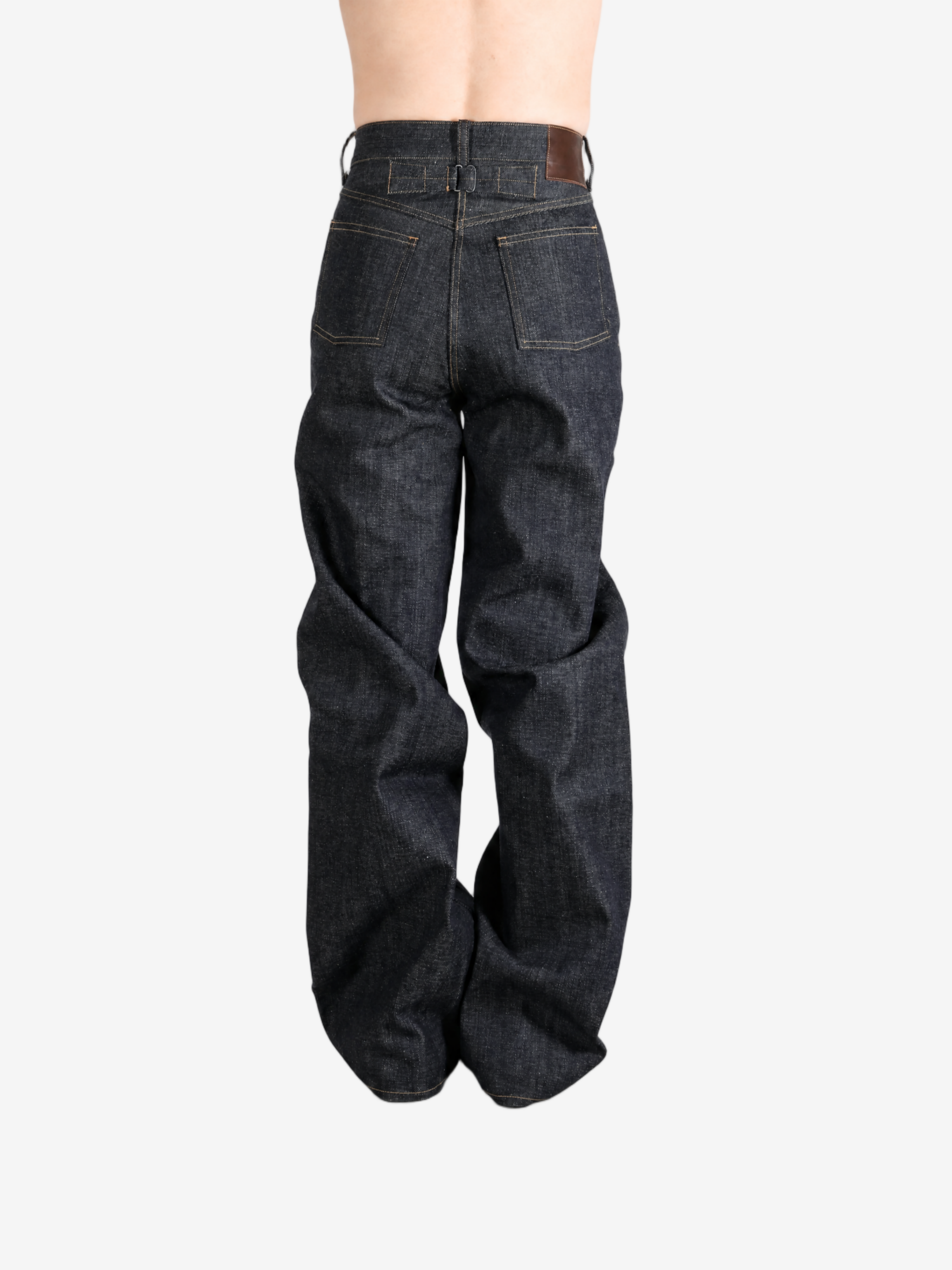 Navy pants worn by a person, showing the pants fit
