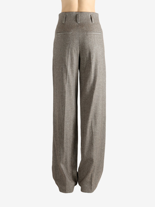 Brown pants worn by a person, showing the pant's ift