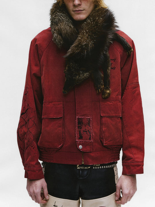 Red jacket worn by a person, showing the  jacket fit