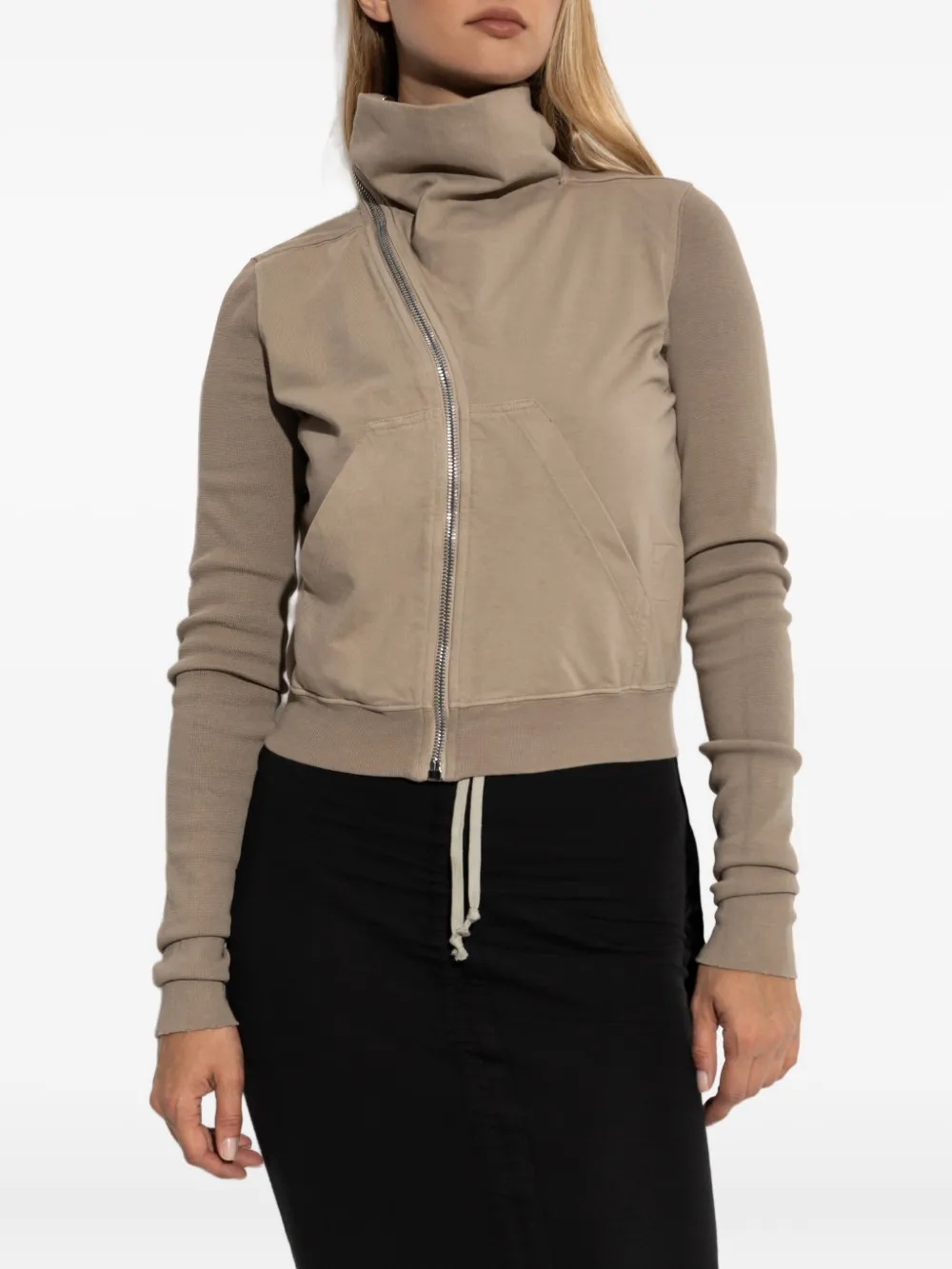 Brown hoodies worn by a person, showing the hoodies fit