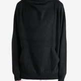 Black hoodie worn by a person, showing the hoodie fit
