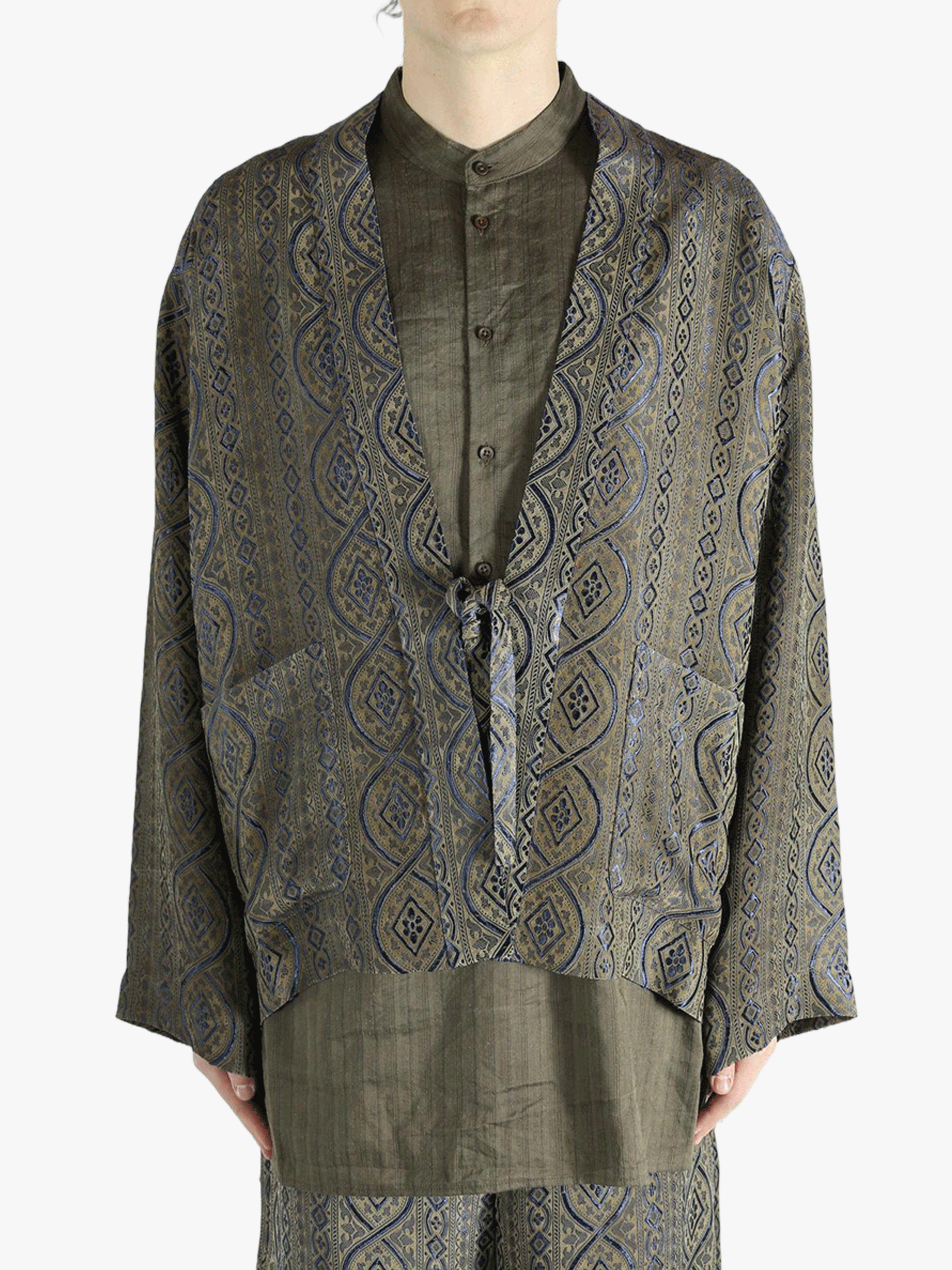 Blue jacket worn by a person, showing the jacket's fit