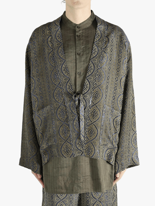 Blue jacket worn by a person, showing the jacket's fit