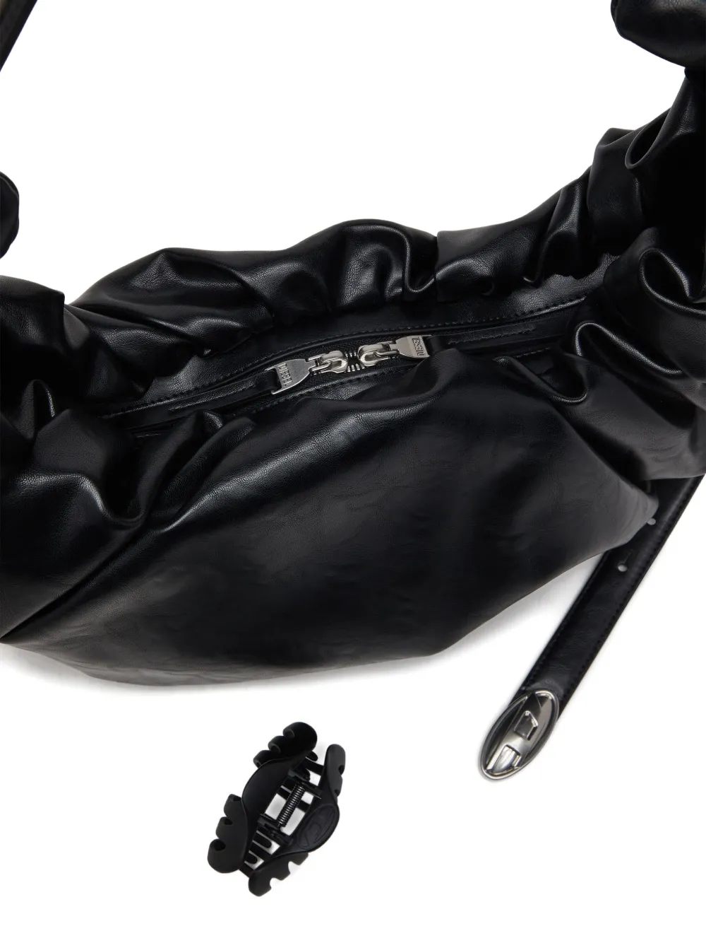 Close up of black bag,showing texture of the polyurethane fabric.