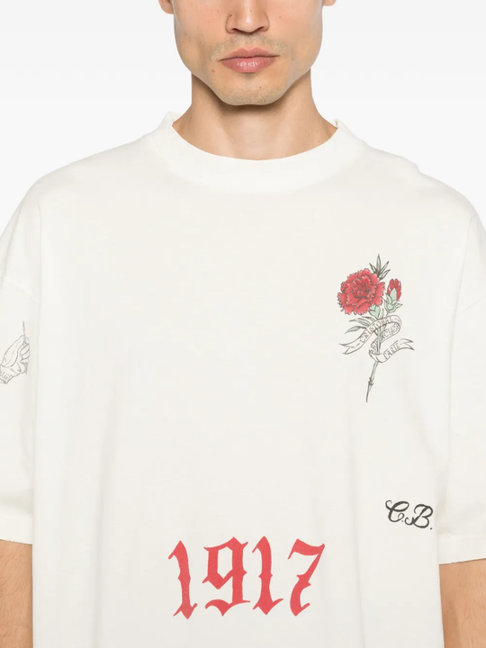 White t-shirt worn by a person, showing the t-shirt fit