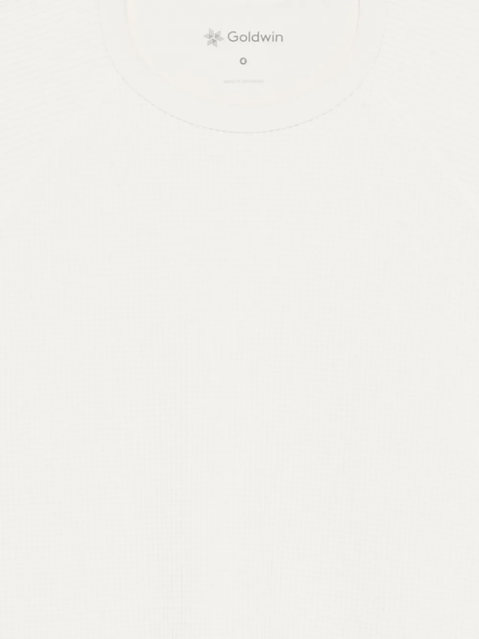 Close up of white t-shirt, showing texture of the Polyester and Elasterell-P fabric