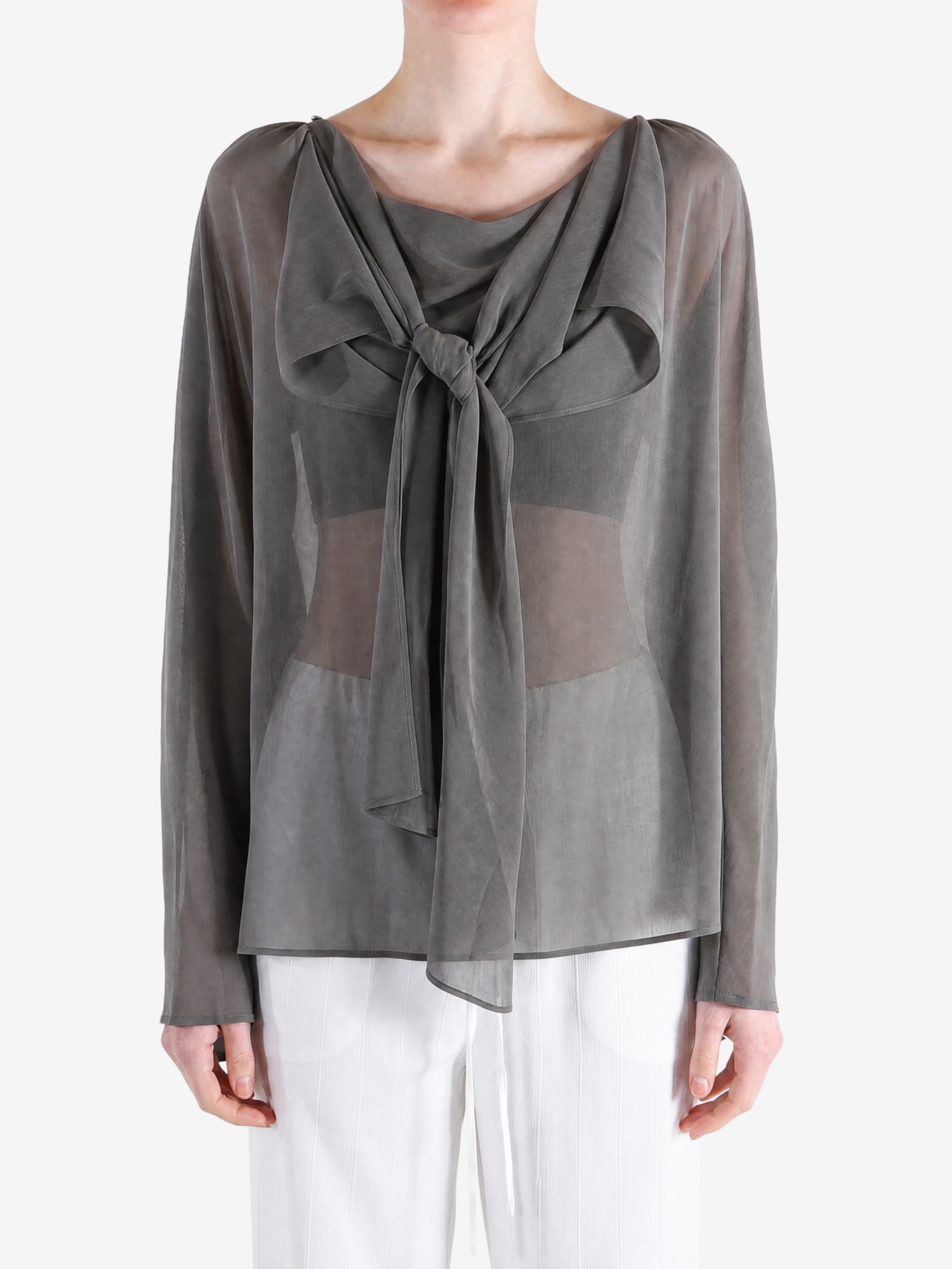 Grey top worn by a person, showing the top fit