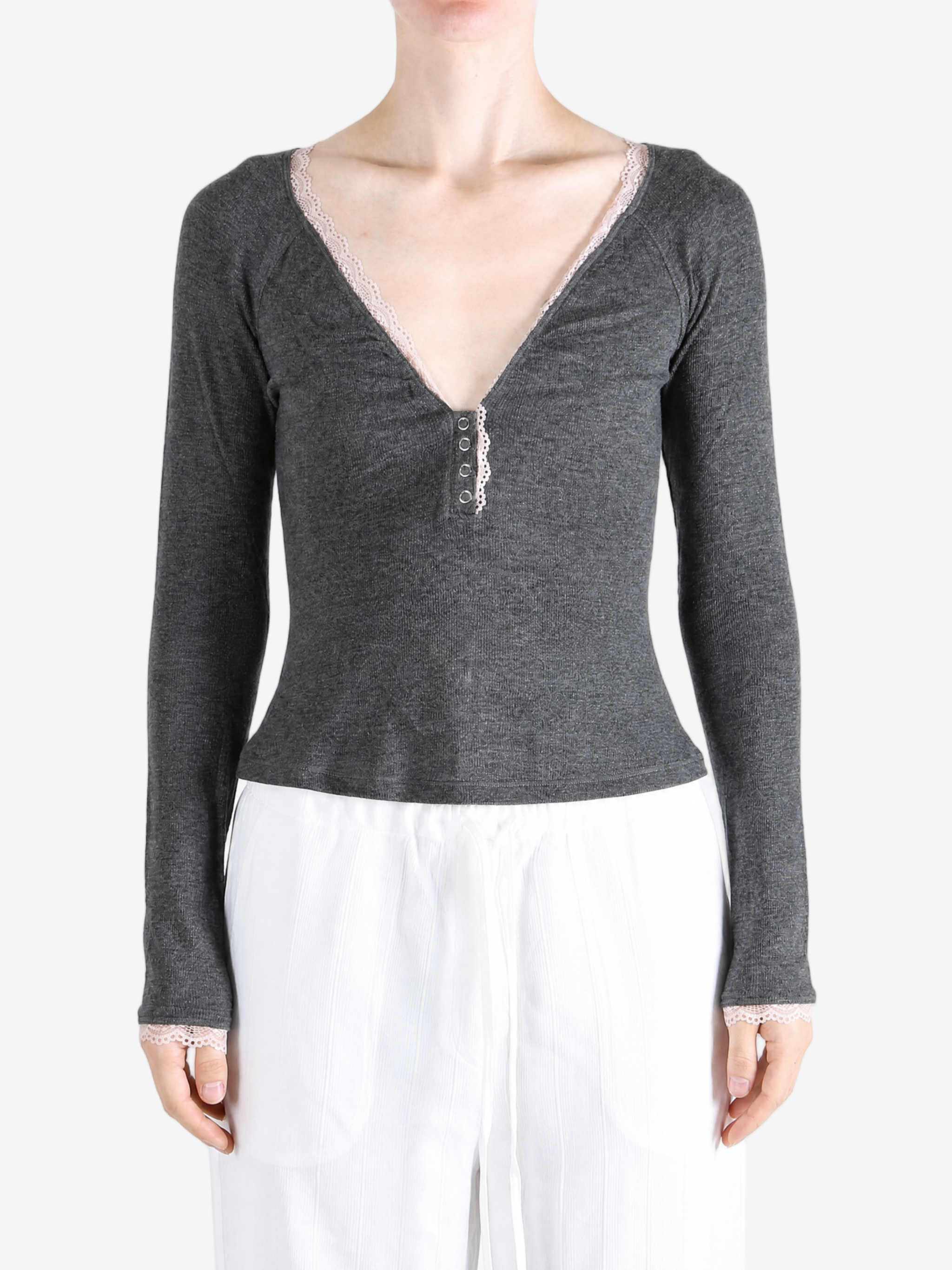 Grey top worn by a person, showing the top fit