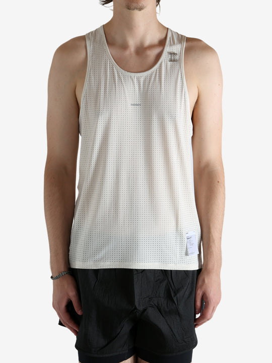 white shirt worn by a person, showing the shirt fit