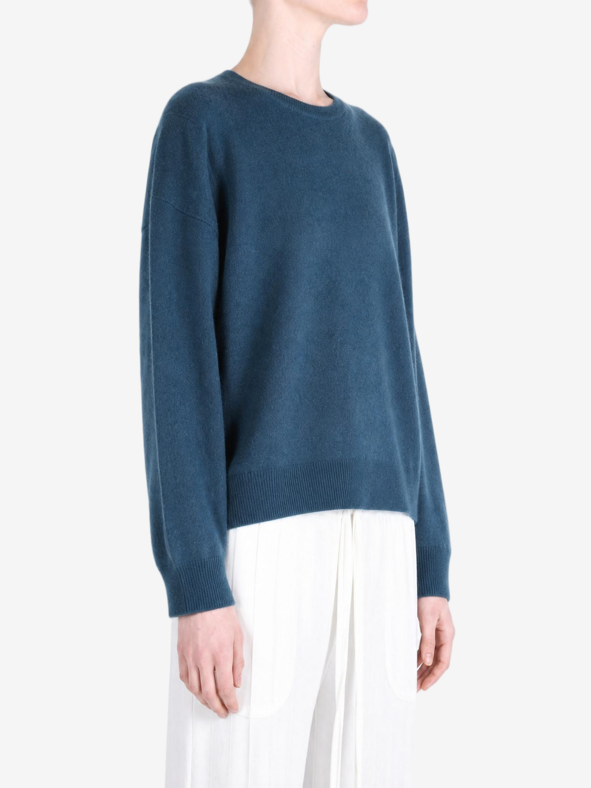Navy hoodie worn by a person, showing the hoodie fit