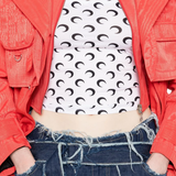 Close up of white tops, showing texture of the Polyamid and Elastane fabric