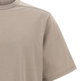 Close up of tan t-shirts, showing texture of the cotton fabric