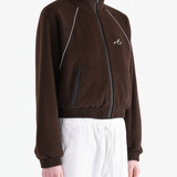 Brown jacket worn by a person, showing the jacket fit