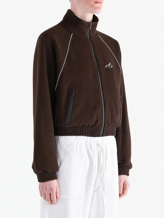 Brown jacket worn by a person, showing the jacket fit