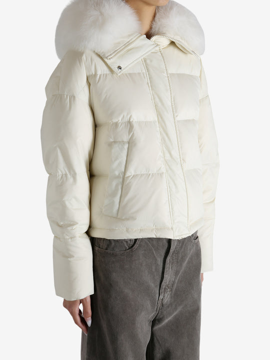 White jacket worn by a person, showing the jacket's fit