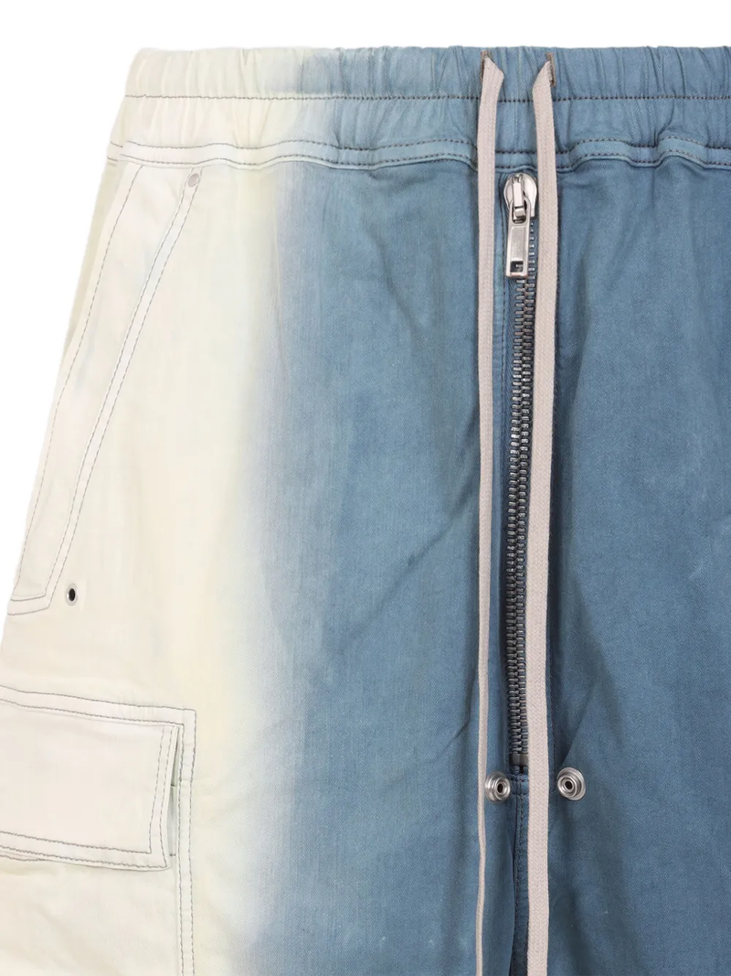 Close up of the blue pant, showing texture of the cotton fabric