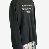 Black t-shirt worn by a person, showing the t-shirt's fit