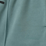 Close up of blue shorts, showing texture of the cotton fabric