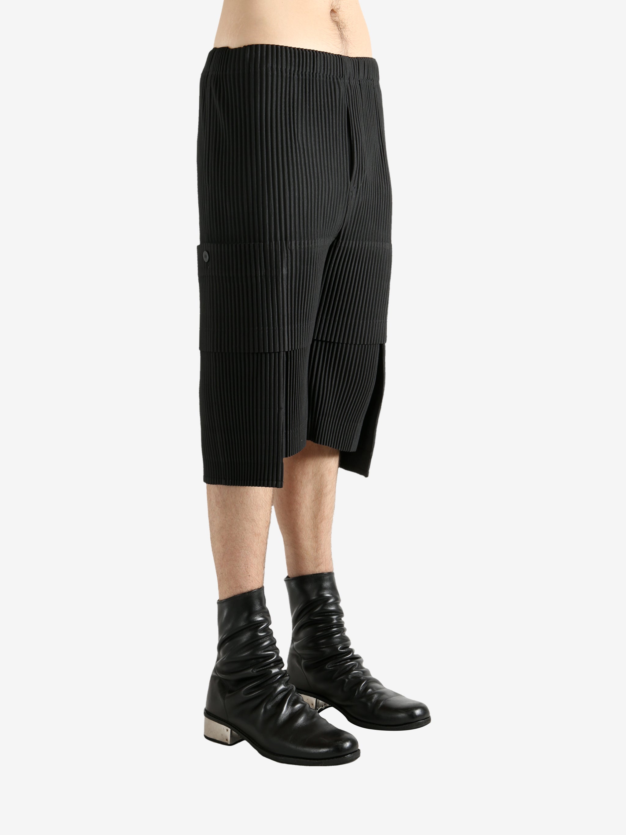 Black shorts worn by a perosn, showing the short's fit