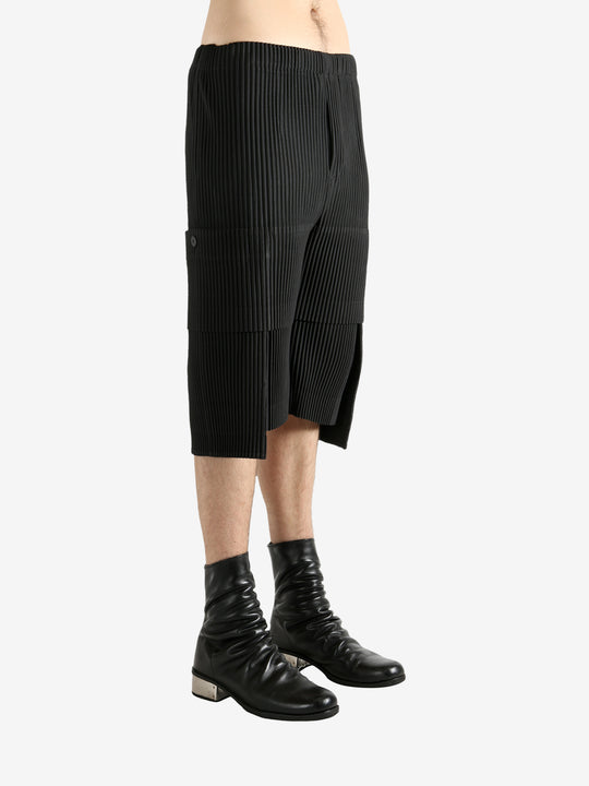 Black shorts worn by a perosn, showing the short's fit