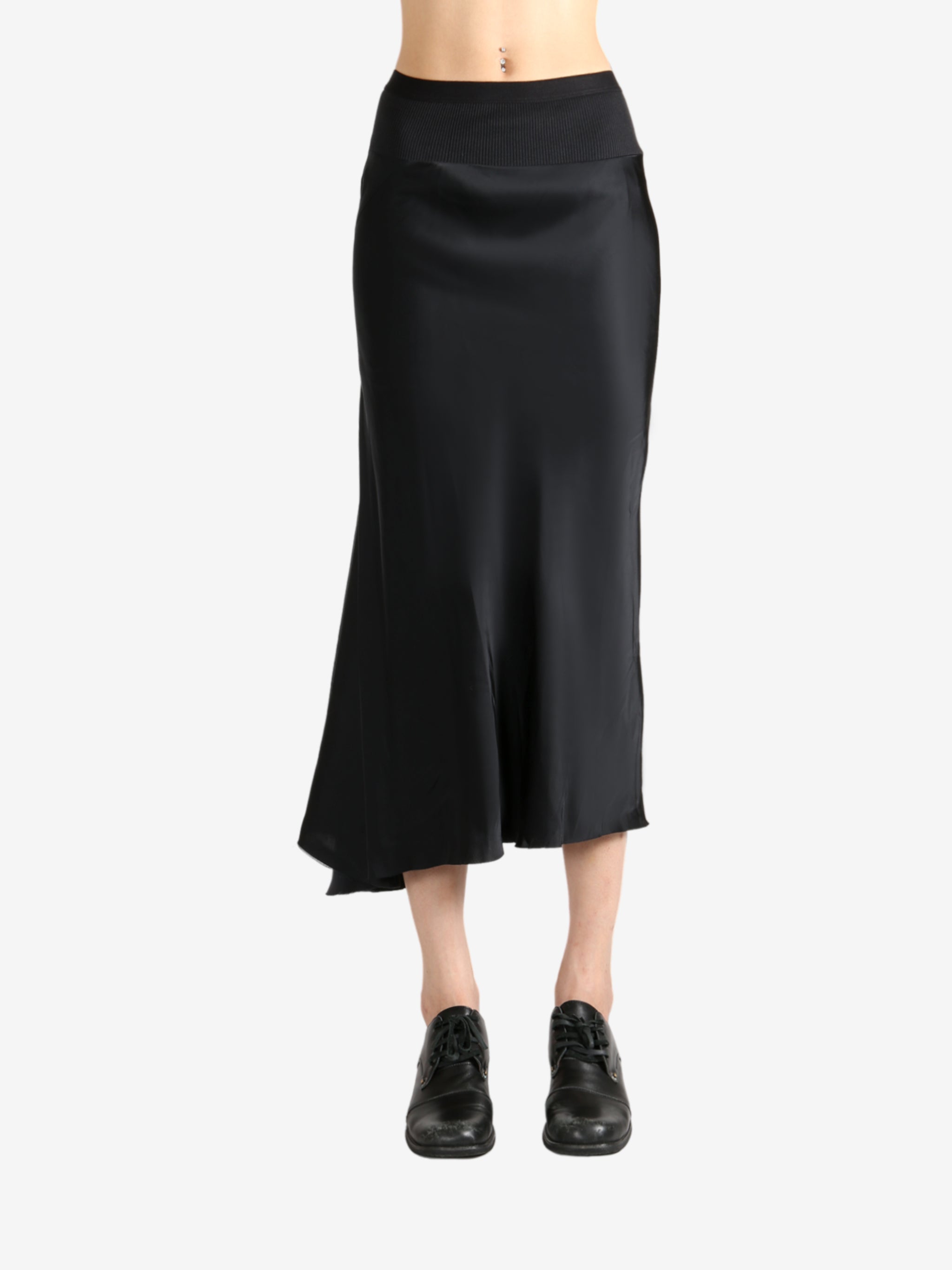 Black skirt worn by a person, showing the skirt's fit