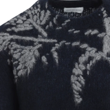 Close up of black sweater,showing texture of the wool fabric