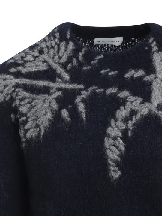 Close up of black sweater,showing texture of the wool fabric